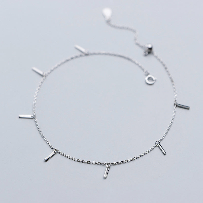 Cavigliera a catena semplice strisce in oro colorato