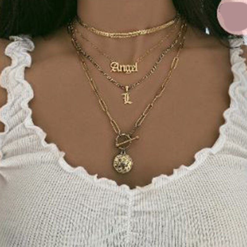 Collana, acciaio al titanio, placcato oro