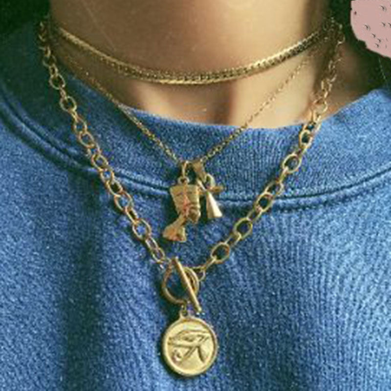 Collana, acciaio al titanio, placcato oro