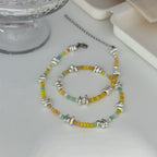 Collana in Argento con Piccoli Pezzi Irregolari