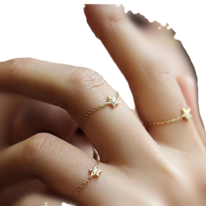 Anello in oro puro 18K con catena di diamanti