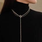 Collana da donna multistrato con perle dal design intrecciato