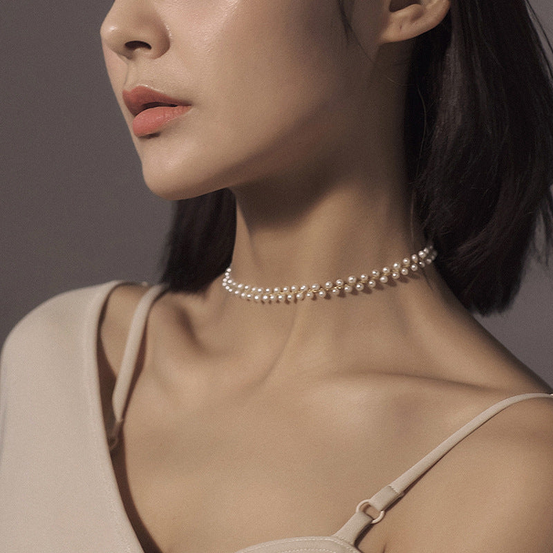 Collana di perle intrecciate a mano