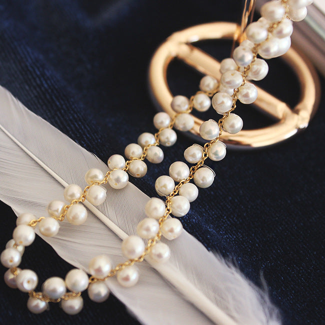 Collana di perle intrecciate a mano