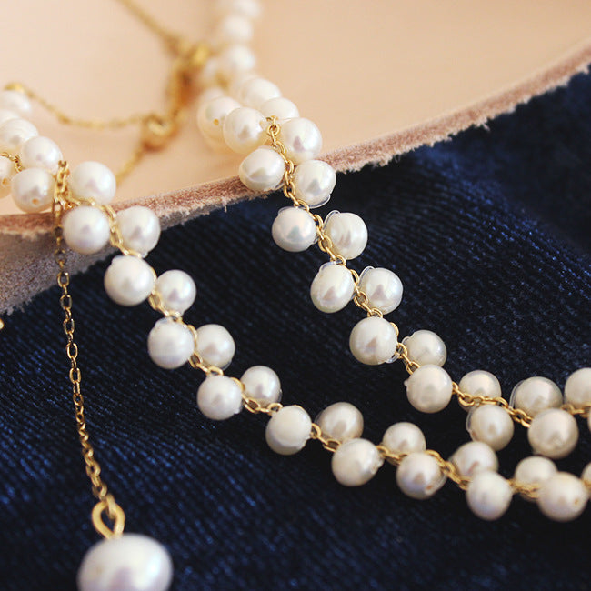 Collana di perle intrecciate a mano