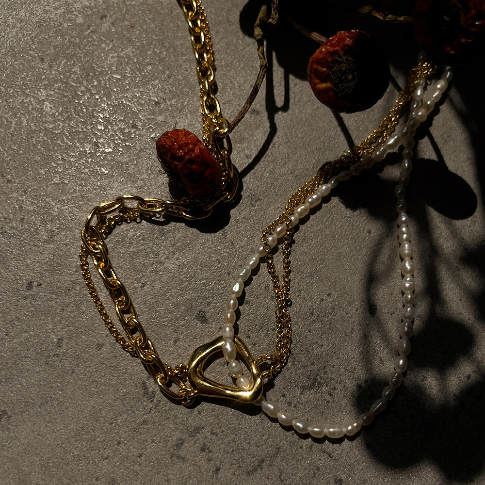 Collana da donna multistrato con perle dal design intrecciato