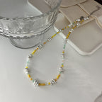 Collana in Argento con Piccoli Pezzi Irregolari