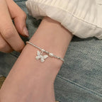 Bracciale Farfalla e Perle in Argento S925 - Eleganza Eterea per la Donna | Gioielli Perfetti - gioielliperfetti.it