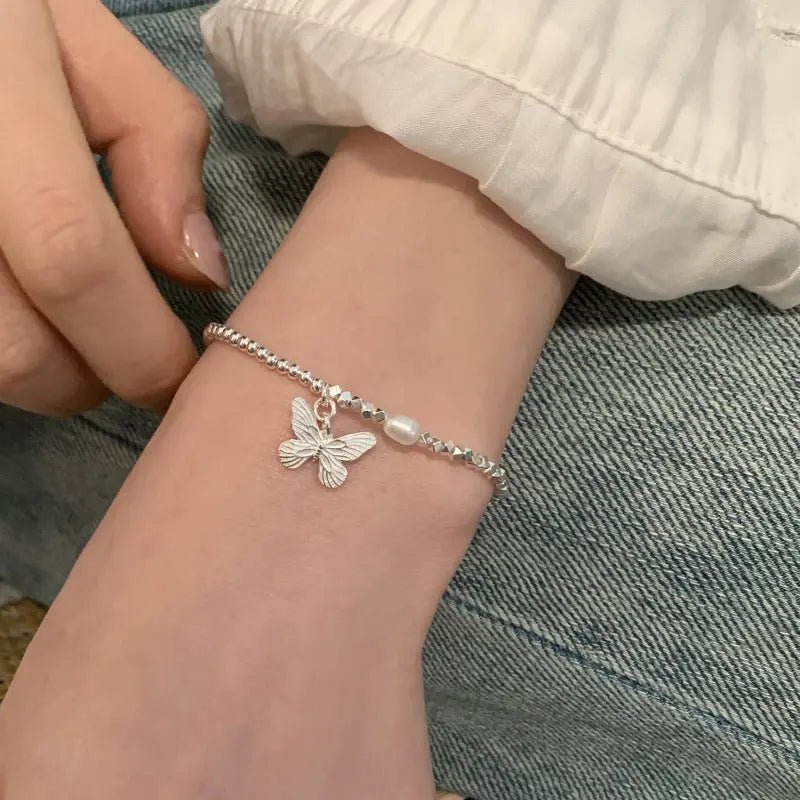 Bracciale Farfalla e Perle in Argento S925 - Eleganza Eterea per la Donna | Gioielli Perfetti - gioielliperfetti.it