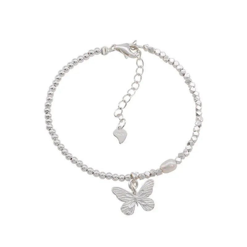 Bracciale Farfalla e Perle in Argento S925 - Eleganza Eterea per la Donna | Gioielli Perfetti - gioielliperfetti.it