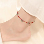 Cavigliera Bracciale Versatile con Perle e Cordino Rosso Intrecciato | Gioielli Perfetti - gioielliperfetti.it