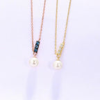Collana Pendente Oro Rosa 14K con Perle d'Acqua Dolce e Zirconi London Blue - Eleganza Raffinata | Gioielli Perfetti - gioielliperfetti.it