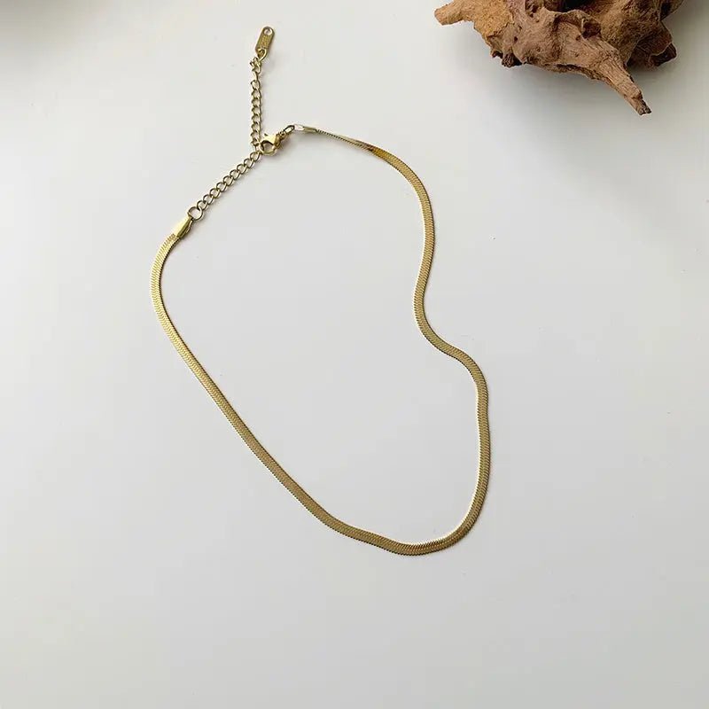 Collana Serpente Acciaio Titanio Oro - Design Moderno & Ipoallergenico | Gioielli Perfetti - gioielliperfetti.it