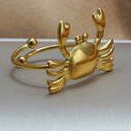 Lxalry 18K Gold Plated Stainless Steel Crab Design Mirror Polish Ring  Hypoallergenic Skin Safe Jewelry With Sphere Accents  Handmade Luxury Gift  Decorative Sculpture For Bold Fashion gioielliperfetti.it