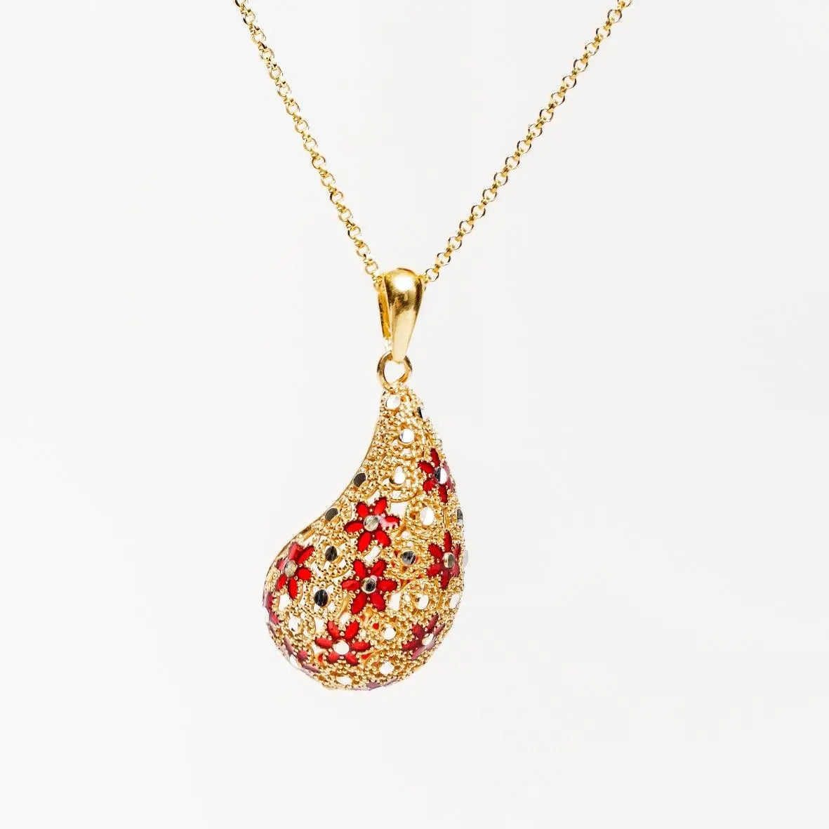 Collana BIG DROP in argento 925 placcato oro 18k con pendente a goccia filigranato, decori rossi e punti luce.